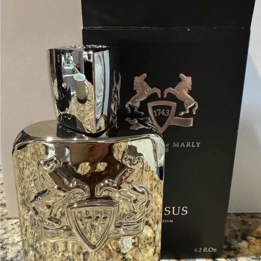 Silver Geometric Perfume Bottle with Ornate Detailing